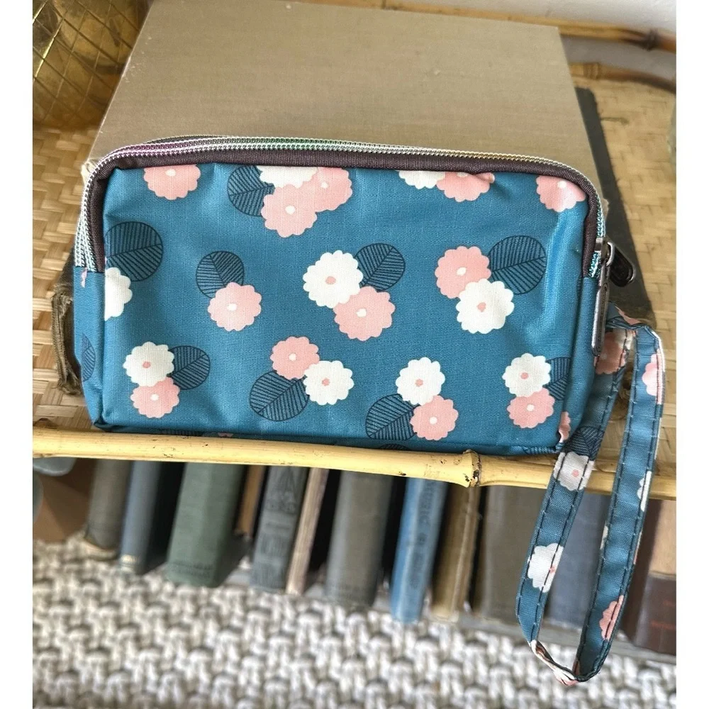 Floral-printed nylon wristlet wallet with three zippered compartments